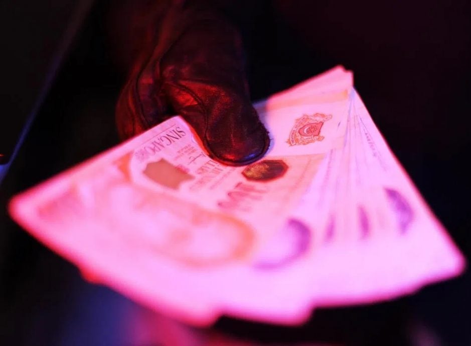 *已签发*柔：狮城二三事：狮城警方再逮1大马男子  涉假官员诈骗将被控