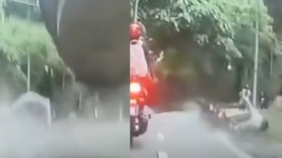 视频| 骑士急转弯失控跌入浅沟 整个人弹飞掀大片水花！