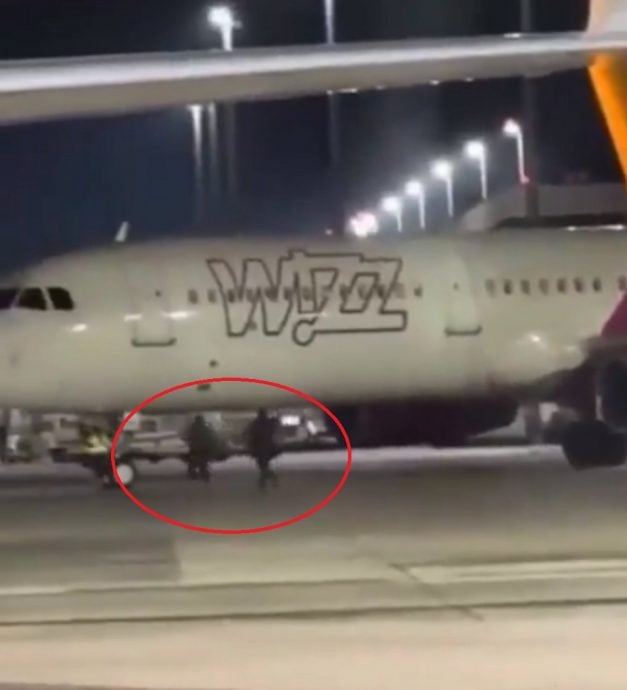 视频/2男错过登机时间 硬闯停机坪挥手拦机