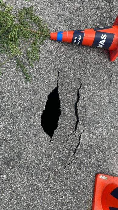 陈俊广：沙占花园住宅区路口出现10尺深坑。