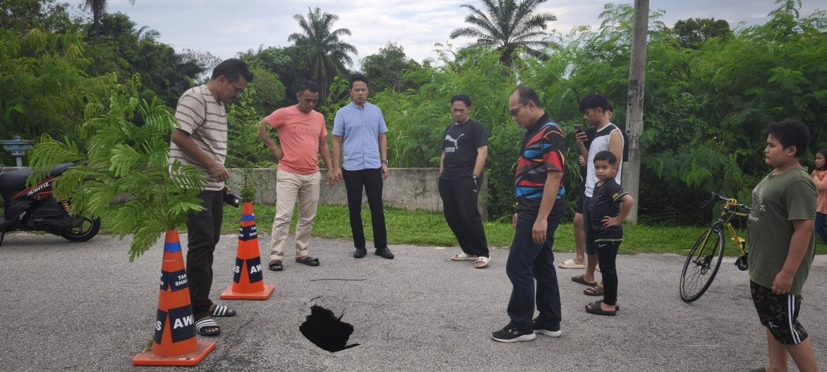 陈俊广：沙占花园住宅区路口出现10尺深坑。