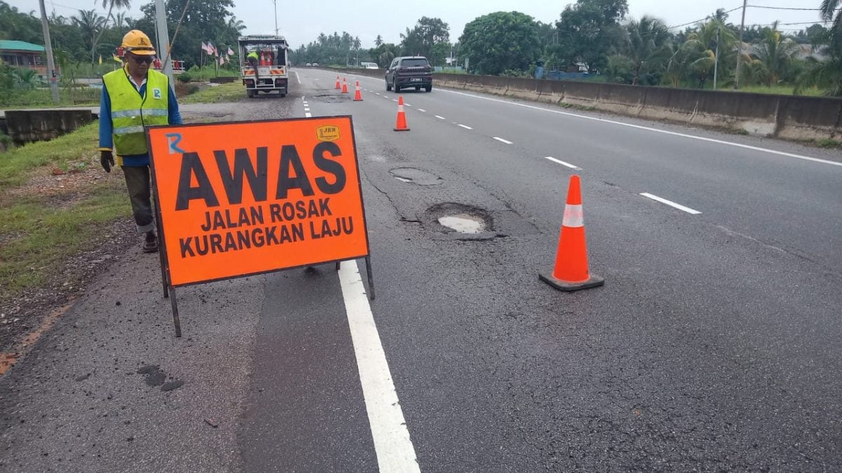 雨水连绵 沙白5号公路现逾千路洞 多车爆胎