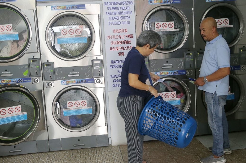 霹/第五版头/雨季加年尾旅游潮 洗衣店需求增迎旺季