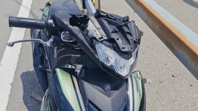 兜风遇死神拦路   骑士撞防撞杆重伤亡