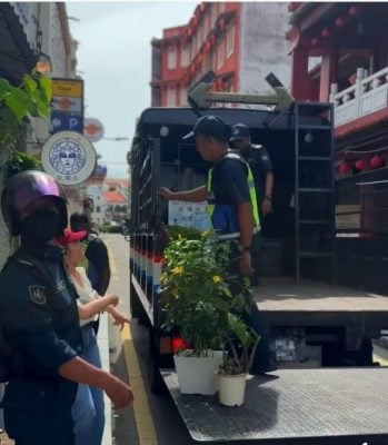 桌椅摆店外马路 充公 市厅取缔罚食肆业者