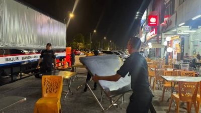 占用停车位五脚基一律受对付   霸占公共空间大取缔