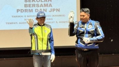 槟岛60所学校委交通纠察员   维持校外交通 保学生安全