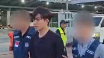 涉金边设局专骗狮城人 大马男被警方移送狮城后被控