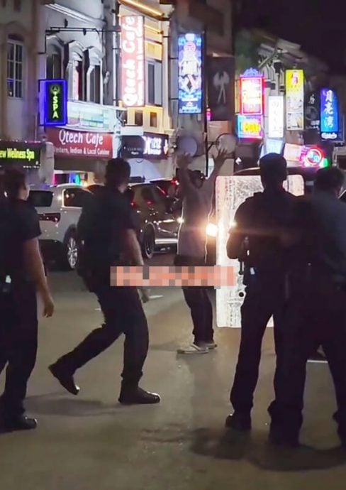 （已签发）柔：狮城二三事：持美工刀肉身挡车 男子大街闹事遭制伏