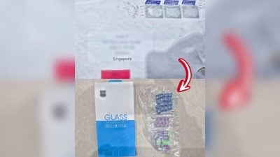 狮城移民局在“屏幕保护膜”盒中 起获50粒摇头丸