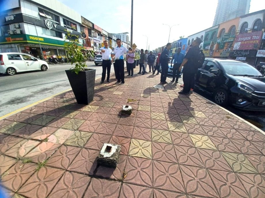 (版2头)大都会/张睷洋大赞加影市区的街道与后巷干净