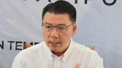 Housing Minister Nga Kor Ming apologises over ” I will call your editor-in-chief” remark