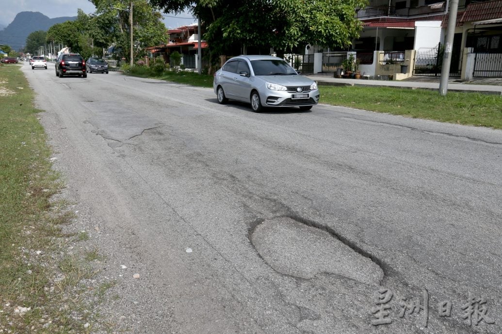轮胎损坏跌伤可索赔 雨季路坑洞投诉激增