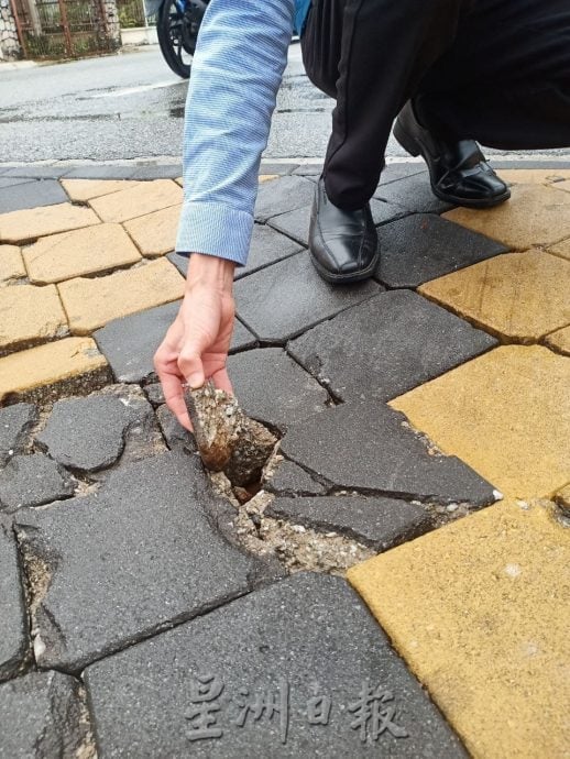 大都会（版2头）/滨中路口路砖陷坑变严重