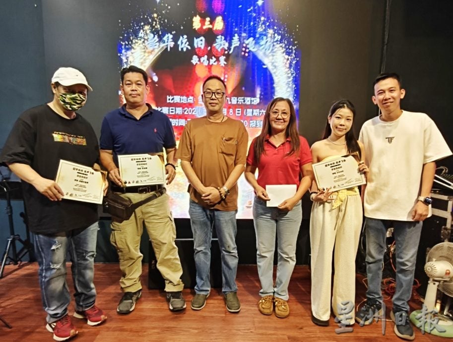 东:世行会办歌赛梁金义夺冠