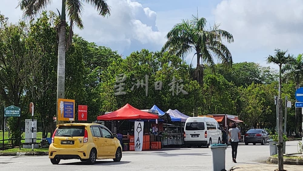 供星洲网/Garden Homes非法路边摊搬迁至新地 小贩生意量降