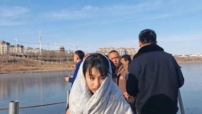 In China, 13-year-old girl praised for heroic rescue of child from icy lake