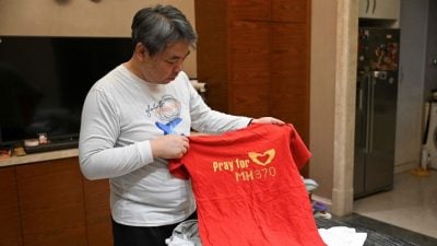 11年不言弃 MH370乘客之子坚持寻找真相