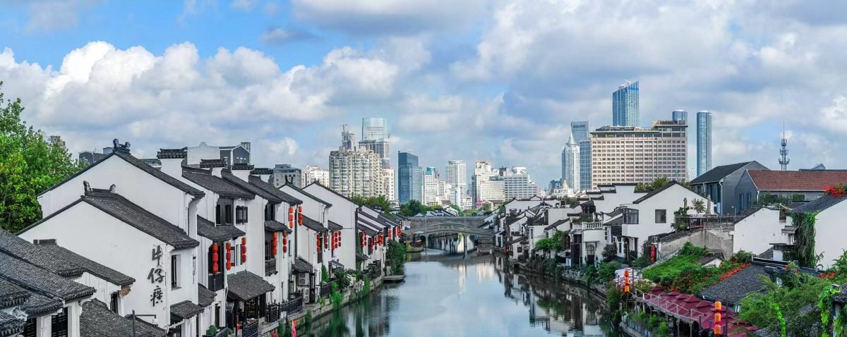 Ancient waterway meets the future: The Grand Canal flows past the city