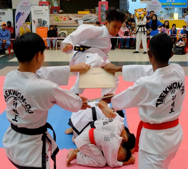 (7/12见报）星角摄/ea跆拳道磨练体魄，也锤炼意志。