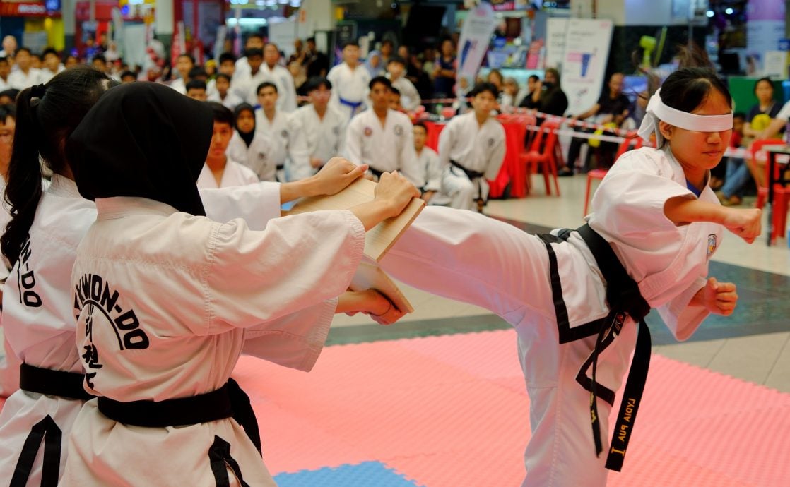 (7/12见报）星角摄/ea跆拳道磨练体魄，也锤炼意志。