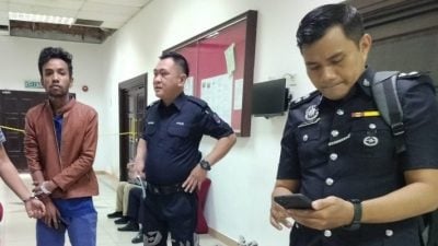 车内勒颈抢包  男子入狱两年