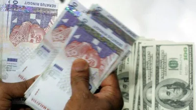 联储局降息提振   马币兑美元升至4年半新高