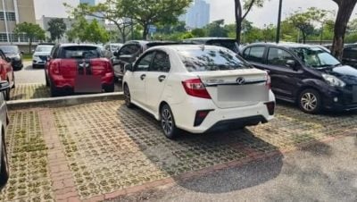 一车占2车位 车主被留纸条警告