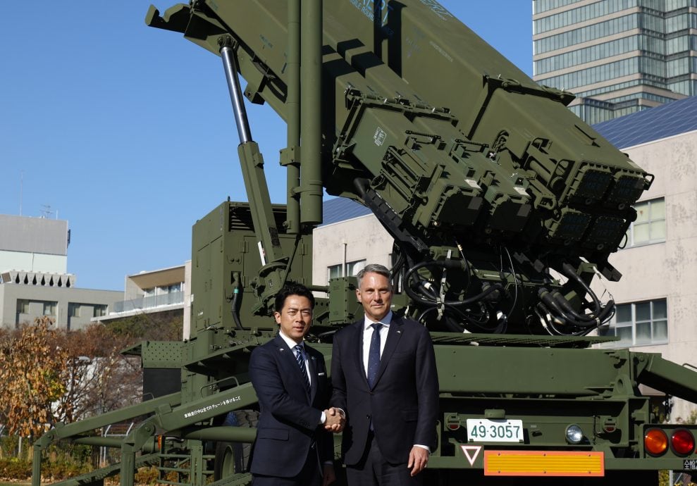 中国战机两度雷达照射日本F-15 日方抗议危险行为