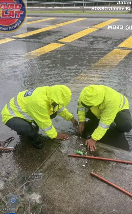 已签发 柔：新闻：徒手清理排水口落叶  新山市政厅闪电行动队效率