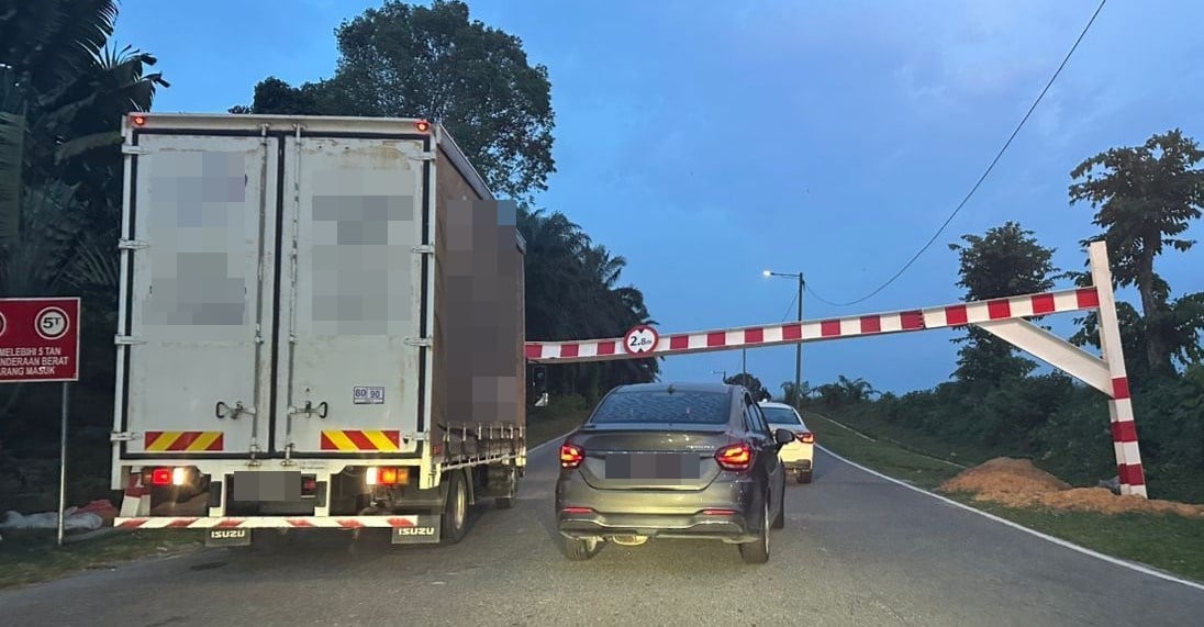 已签发 柔：版二头条：太子城往机场捷径风波再起 罗里撞坏限高杆连夜被拆