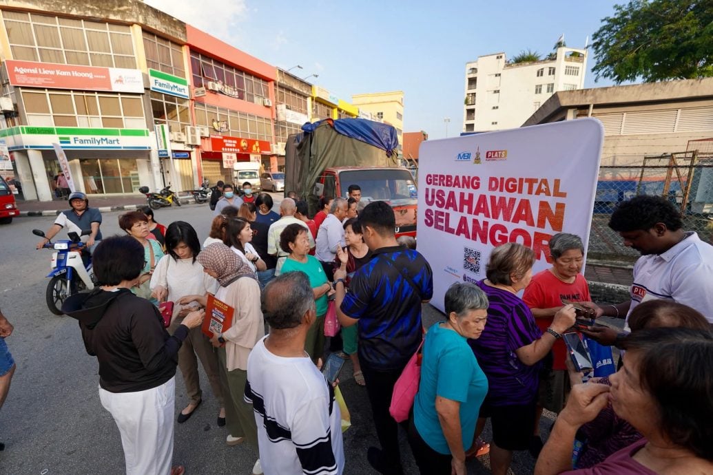 已签发（大都会）巴生市政厅在永安镇派发数码优惠券获热烈回响