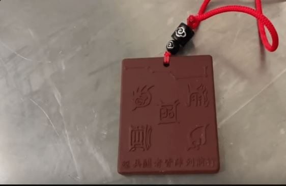 拚图两图已签)“护身符”成催命符 辽宁入境客触发核警报 辐射超标1686倍