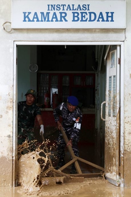 洪灾疫病蔓延医疗濒临崩溃 灾后重建需127亿令吉