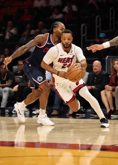 熊熊燃烧出疯狂30比2攻势  热火24记三分弹击沉快艇