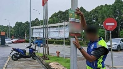 瓜冷市会整顿市容   拆非法立牌横幅