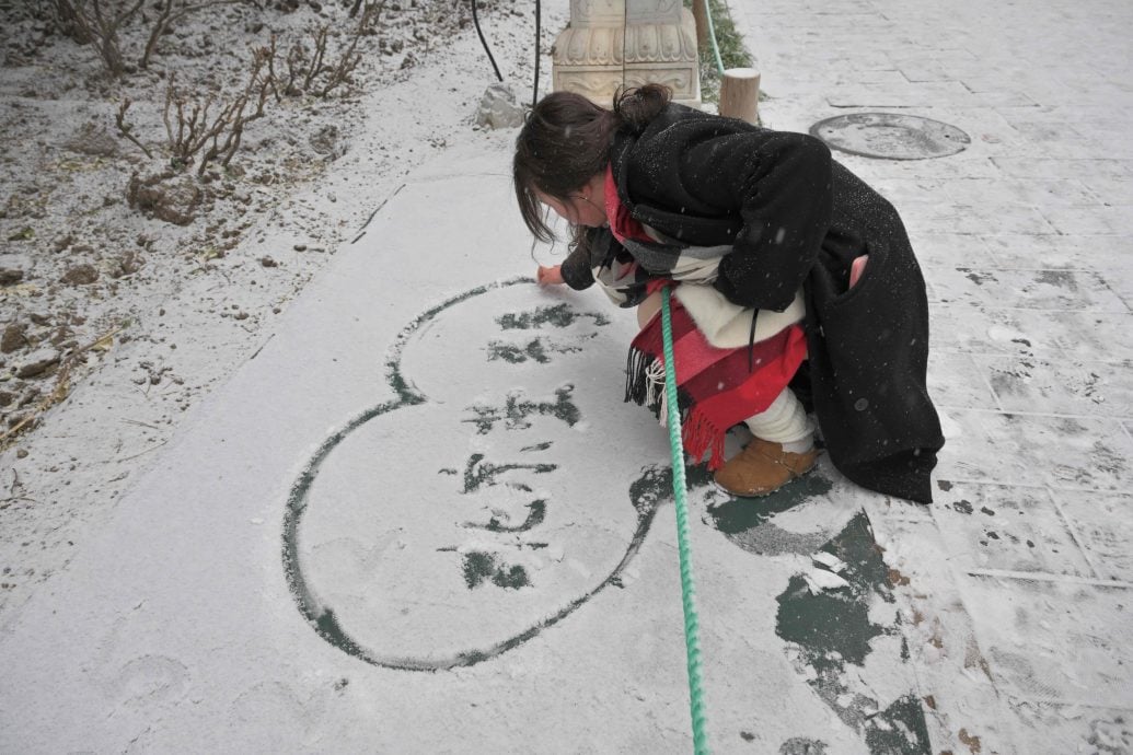 看世界三图)北京城区降雪 初雪时间较常年偏晚9天