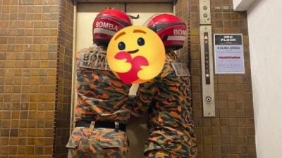 路人听见呼救声报警 9人被困电梯获救