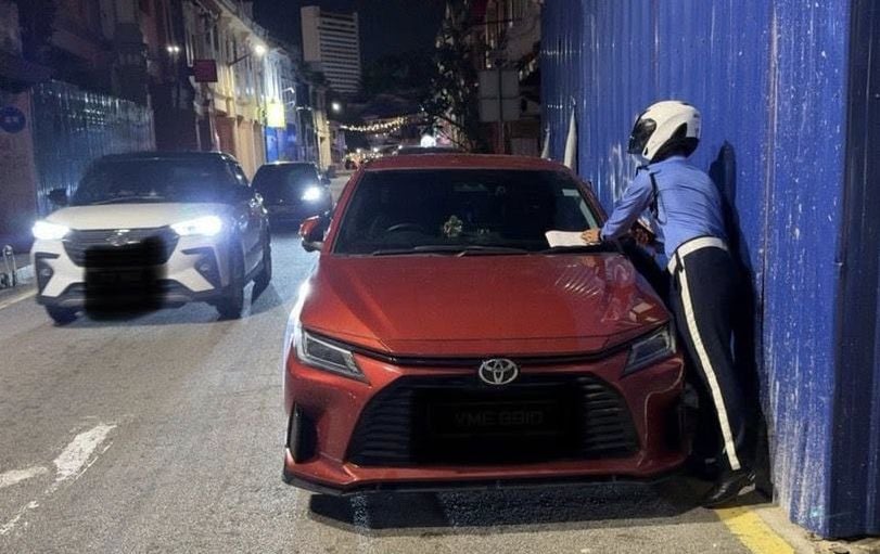 （古城第三版主文）雷宝祥:随意停放的摩托可被拖走