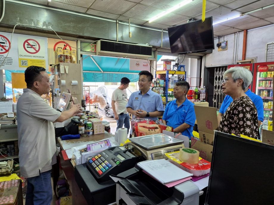 获峇京果商公会协助 峇29商店加入MyKasih计划