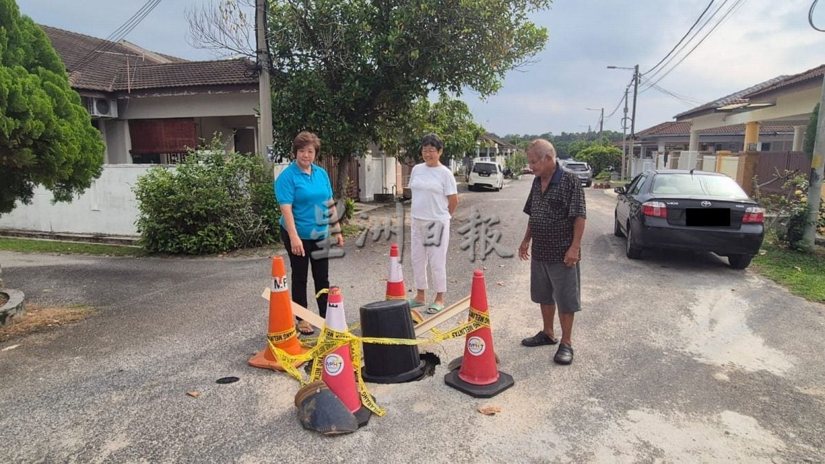 （古城第三版主文）武吉卡迪绍嘉纳住宅区马路中间突然下陷形成大洞